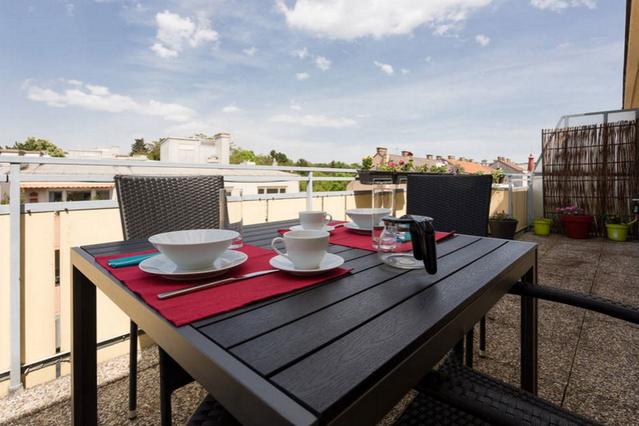Visit-Vienna - Bright Roof Terrace Morning Sun